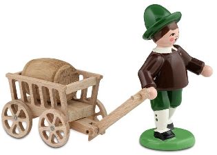 Bursche mit Handwagen